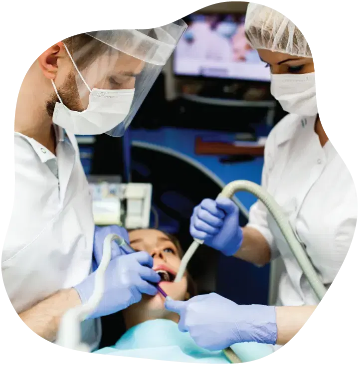 Dental team working on a patient