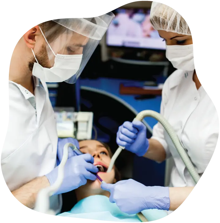 Dental team working on a patient